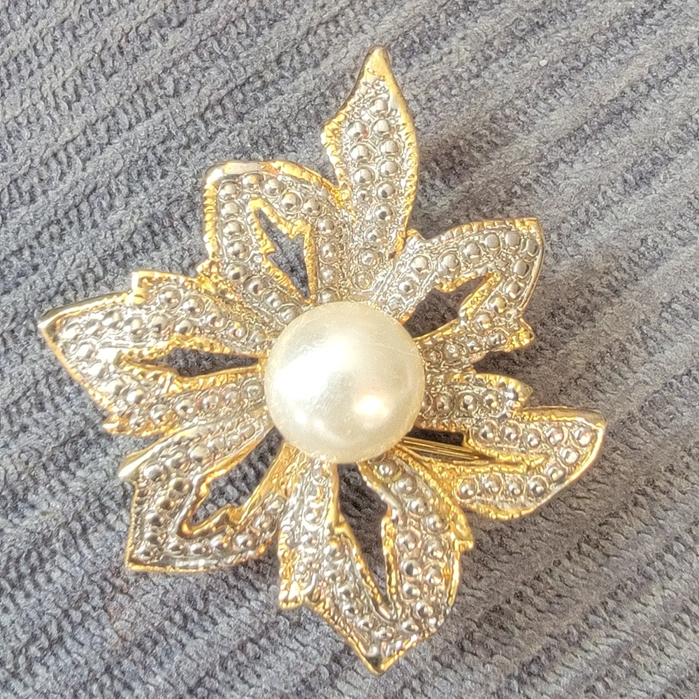 Elegant Gold and Silver Floral Brooch